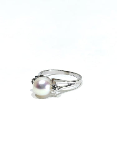 Bague 53 Bague en or blanc 18 carats avec perle et diamants 58 Facettes 1714229