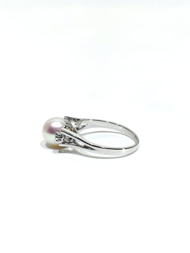 Bague 53 Bague en or blanc 18 carats avec perle et diamants 58 Facettes 1714229