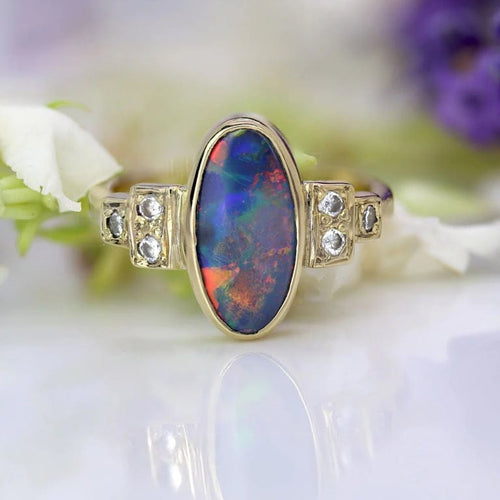 Bague 50 Bague opale noire et diamants en or jaune 18 carats 58 Facettes 25-087