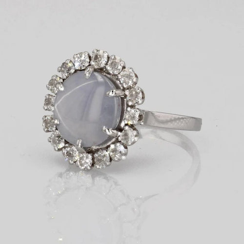 Bague 52 Bague marguerite en or blanc et platine, saphir étoilé et diamants 58 Facettes 24-150