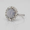 Bague 52 Bague marguerite en or blanc et platine, saphir étoilé et diamants 58 Facettes 24-150