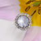 Bague 52 Bague marguerite en or blanc et platine, saphir étoilé et diamants 58 Facettes 24-150