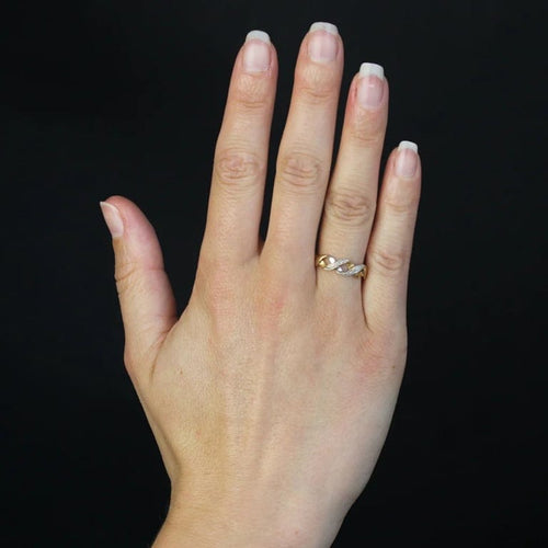 Bague 53 Bague moderne entrelacée en or jaune et blanc avec diamants 58 Facettes 16-344D