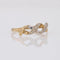 Bague 53 Bague moderne entrelacée en or jaune et blanc avec diamants 58 Facettes 16-344D