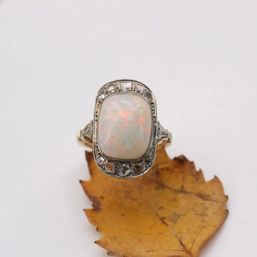 Bague 50 Bague Art déco en or jaune 18 carats, platine, opale et diamants 58 Facettes 23-290