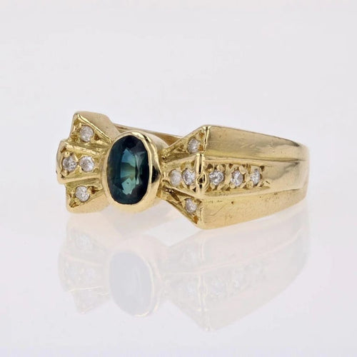 Bague 53 Bague nœud en or jaune 18 carats saphir et diamants 58 Facettes 21-222B