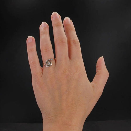 Bague 48 Bague tourbillon en or jaune et platine avec diamants 58 Facettes 23-133