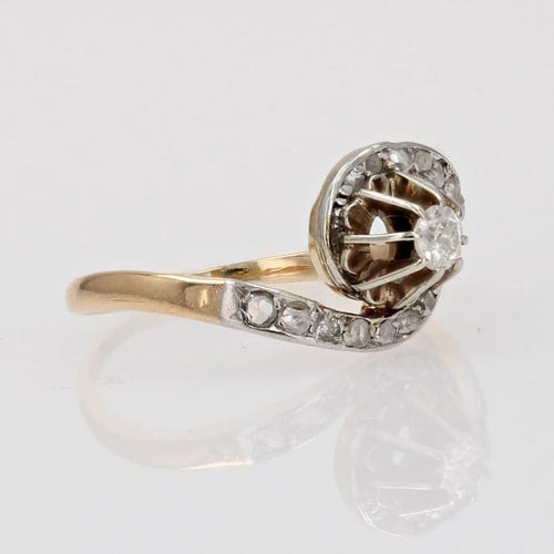 Bague 48 Bague tourbillon en or jaune et platine avec diamants 58 Facettes 23-133