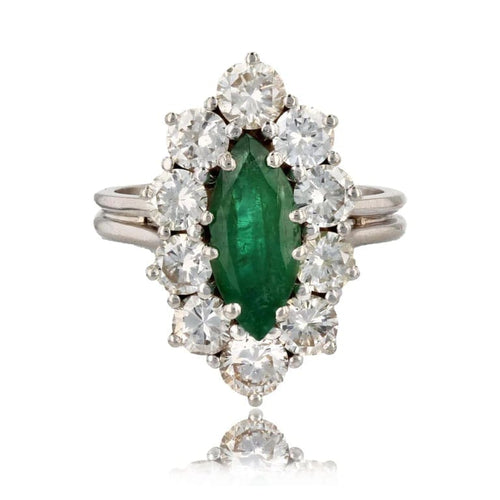 Bague 54 Bague marquise en or blanc 18 carats, émeraude et diamants 58 Facettes 22-315
