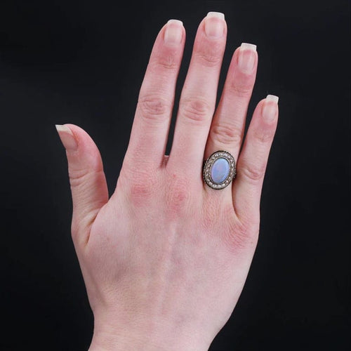 Bague 48 Bague ancienne en or jaune 18 carats, opale, perles fines et émail 58 Facettes 22-493
