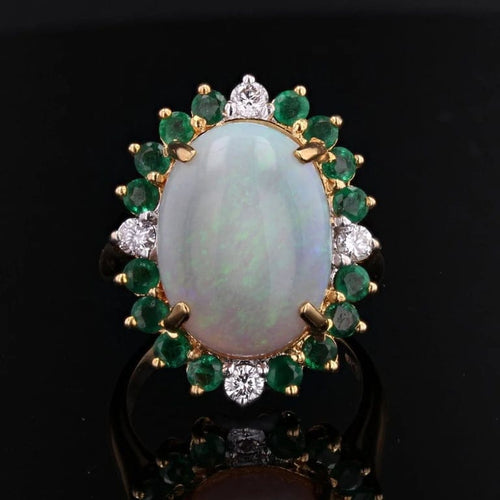 Bague 54 Bague en or jaune 18 carats à opale, émeraudes et diamants 58 Facettes 22-557