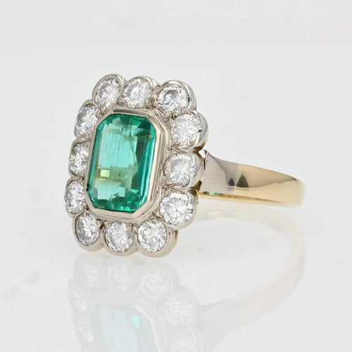 Bague 55 Bague rectangulaire émeraude et diamants en or jaune et platine 58 Facettes 22-490