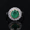 Bague 50 Bague ancienne ronde en platine et or jaune 18 carats, émeraude et diamants 58 Facettes 22-426
