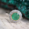 Bague 50 Bague ancienne ronde en platine et or jaune 18 carats, émeraude et diamants 58 Facettes 22-426