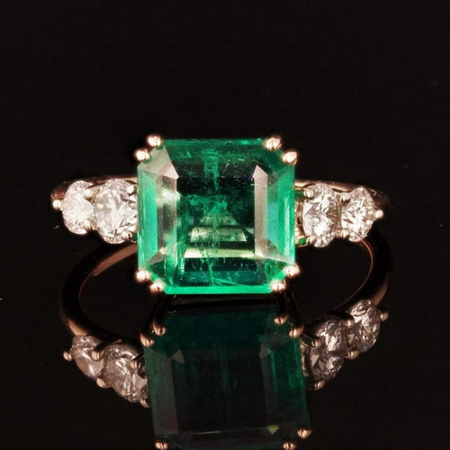 Bague 54 Bague émeraude et diamants en or rose 18 carats 58 Facettes 22-326
