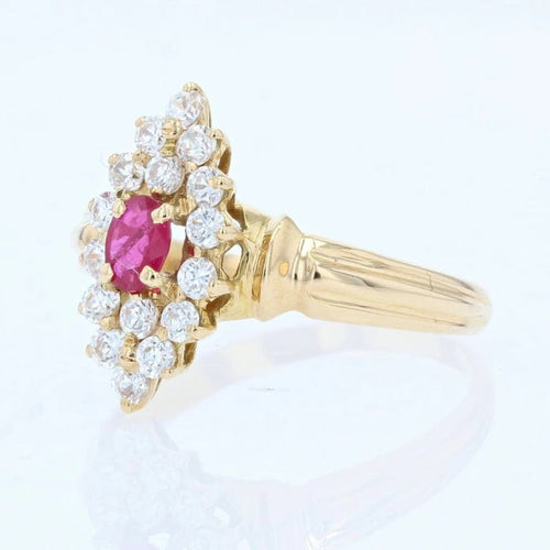 Bague 54 Bague marquise en or jaune 18 carats, rubis et diamants 58 Facettes 22-207