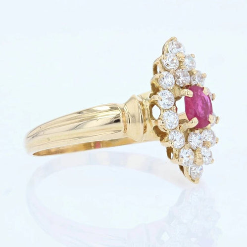 Bague 54 Bague marquise en or jaune 18 carats, rubis et diamants 58 Facettes 22-207