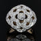 Bague 48 Bague dôme fleur ajourée en or jaune 18 carats, platine et diamants 58 Facettes 21-620