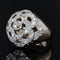 Bague 48 Bague dôme fleur ajourée en or jaune 18 carats, platine et diamants 58 Facettes 21-620
