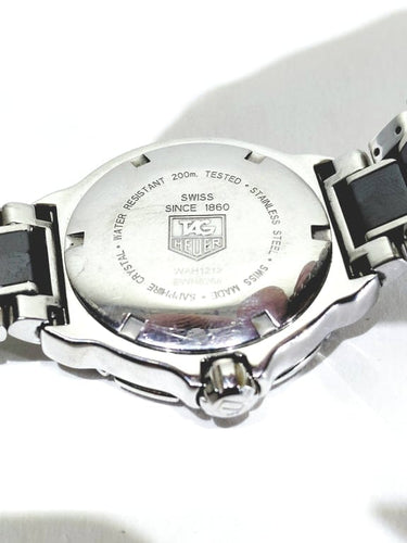 Montre TAG Heuer Formula 1 - Montre femme en céramique et acier diamants 58 Facettes 1714282