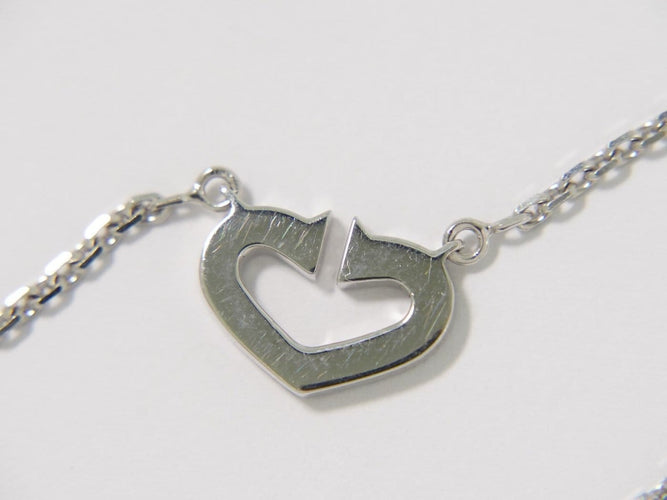 Pendentif Cartier - Pendentif C Heart de Cartier en or blanc et diamant 58 Facettes zwvgx5