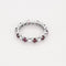 Bague 50 Alliance en or blanc, diamants et rubis 58 Facettes PER0565