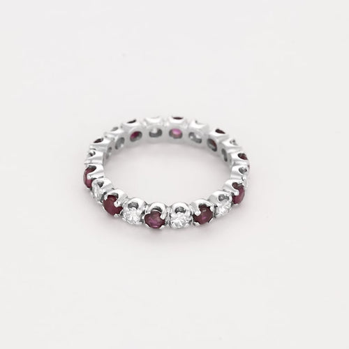 Bague 50 Alliance en or blanc, diamants et rubis 58 Facettes PER0565