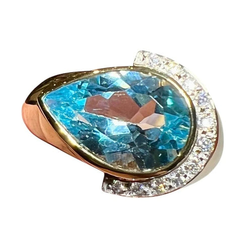 Bague 60 Bague en or jaune 18 carats avec topaze bleue poire et diamants 58 Facettes 7861 A