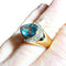 Bague 60 Bague en or jaune 18 carats avec topaze bleue poire et diamants 58 Facettes 7861 A
