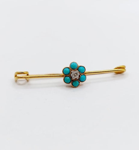 Broche Broche épingle à nourrice marguerite en or 18k, diamant et turquoises 58 Facettes A06686