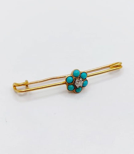 Broche Broche épingle à nourrice marguerite en or 18k, diamant et turquoises 58 Facettes A06686