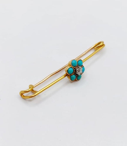 Broche Broche épingle à nourrice marguerite en or 18k, diamant et turquoises 58 Facettes A06686