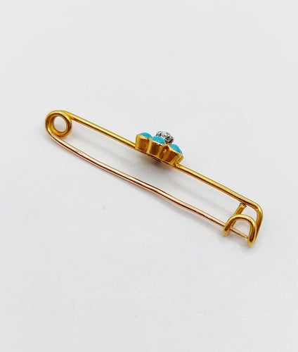 Broche Broche épingle à nourrice marguerite en or 18k, diamant et turquoises 58 Facettes A06686