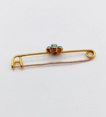 Broche Broche épingle à nourrice marguerite en or 18k, diamant et turquoises 58 Facettes A06686
