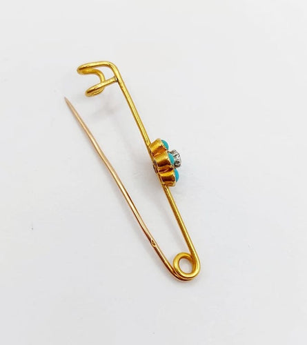 Broche Broche épingle à nourrice marguerite en or 18k, diamant et turquoises 58 Facettes A06686