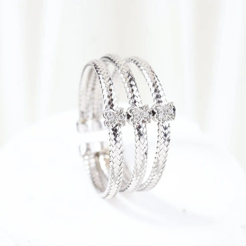 Bague 66 TOUS - Bague triple tressée en or blanc 18 carats et diamants 58 Facettes J000002214