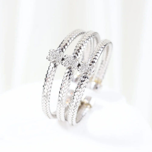 Bague 66 TOUS - Bague triple tressée en or blanc 18 carats et diamants 58 Facettes J000002214
