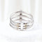 Bague 66 TOUS - Bague triple tressée en or blanc 18 carats et diamants 58 Facettes J000002214