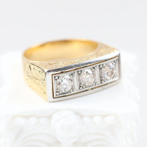 Bague 54 Bague vintage trois pierres en or jaune, platine et diamants 58 Facettes 2335