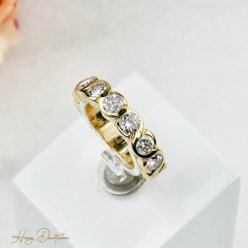 Bague 55 Bague mémoire demi-tour en or jaune 18 carats et diamants 58 Facettes 1592
