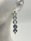 Boucles d'oreilles Créoles - Boucles d'oreilles en or jaune 18K et topazes bleues 58 Facettes 149064377