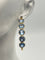 Boucles d'oreilles Créoles - Boucles d'oreilles en or jaune 18K et topazes bleues 58 Facettes 149064377