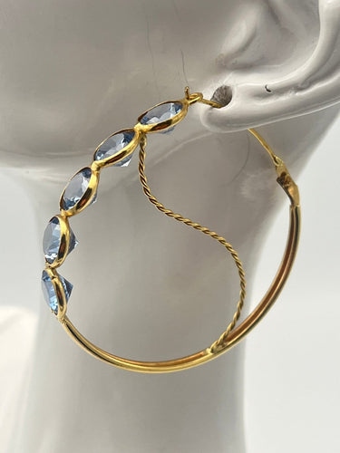 Boucles d'oreilles Créoles - Boucles d'oreilles en or jaune 18K et topazes bleues 58 Facettes 149064377