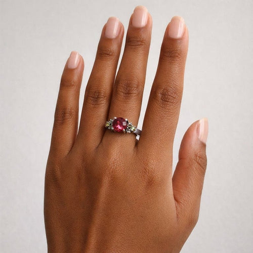 Bague 50 Bague vintage en or blanc 18k avec tourmaline ovale et péridots 58 Facettes 50346