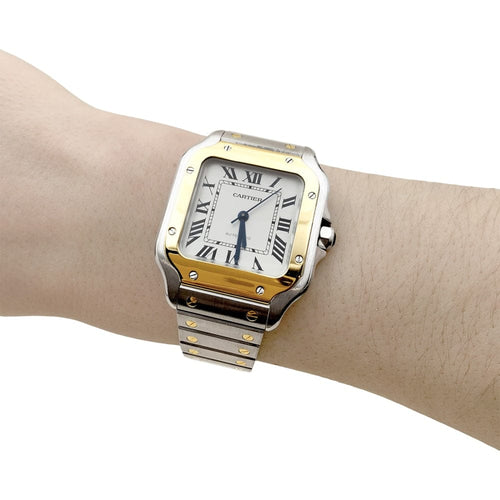 Montre Montre Cartier, "Santos", acier et or. 58 Facettes 35389