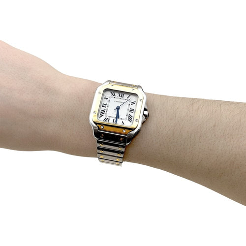 Montre Montre Cartier, "Santos", acier et or. 58 Facettes 35389