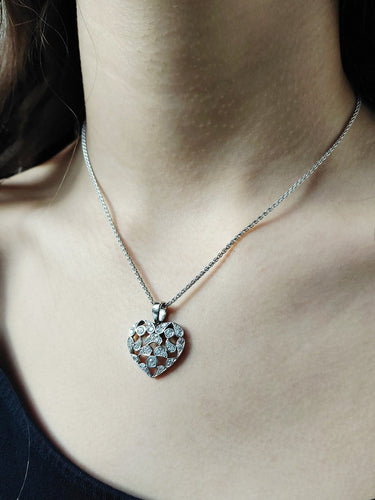 Collier Collier cœur - Pendentif en or blanc 750 et diamants 58 Facettes 1716769