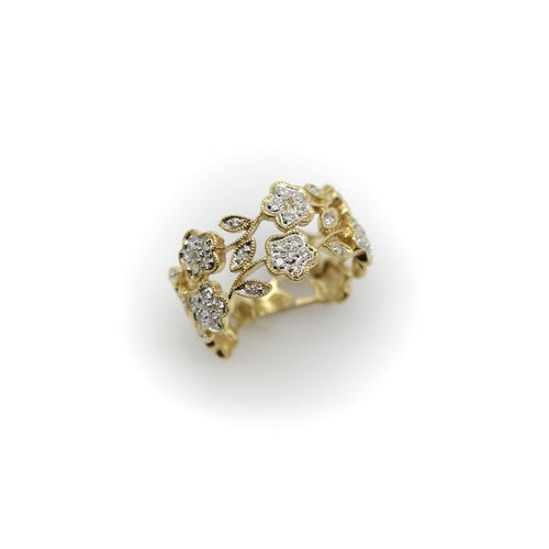 Bague Bague vintage fleurie en filigrane en or 14k et diamants 58 Facettes A20046