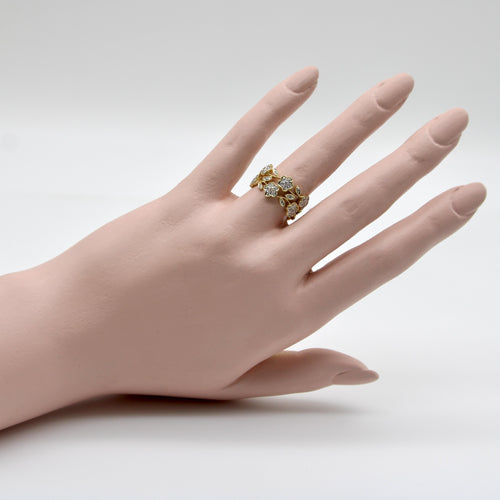 Bague Bague vintage fleurie en filigrane en or 14k et diamants 58 Facettes A20046