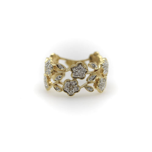 Bague Bague vintage fleurie en filigrane en or 14k et diamants 58 Facettes A20046